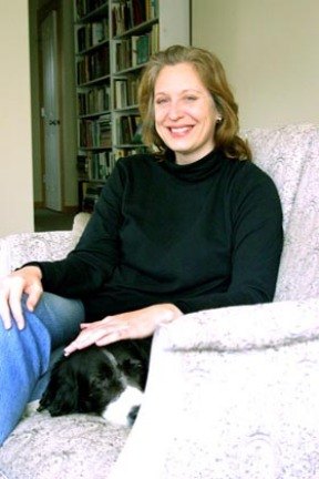 Author Natalia Ilyin relaxes with her companion Jamie in her Bainbridge Island home.