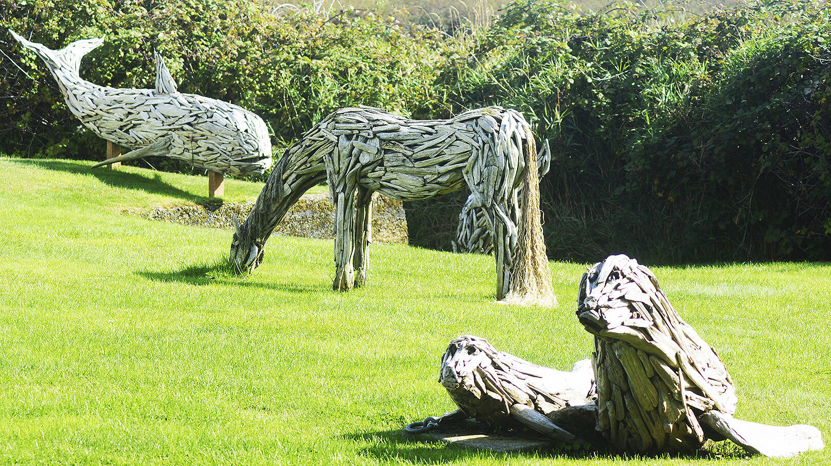 Animal artwork adorns the lighthouse yard.