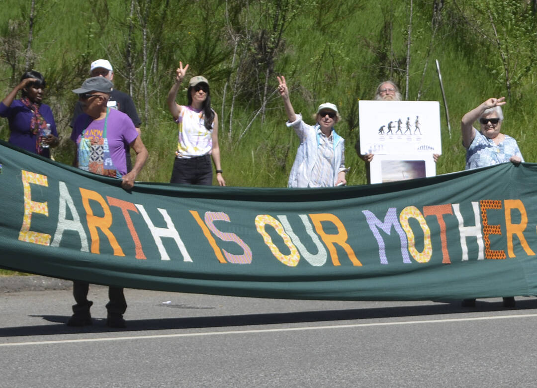 Peace activists show their banner protesting nuclear arms. Ground Zero courtesy photo