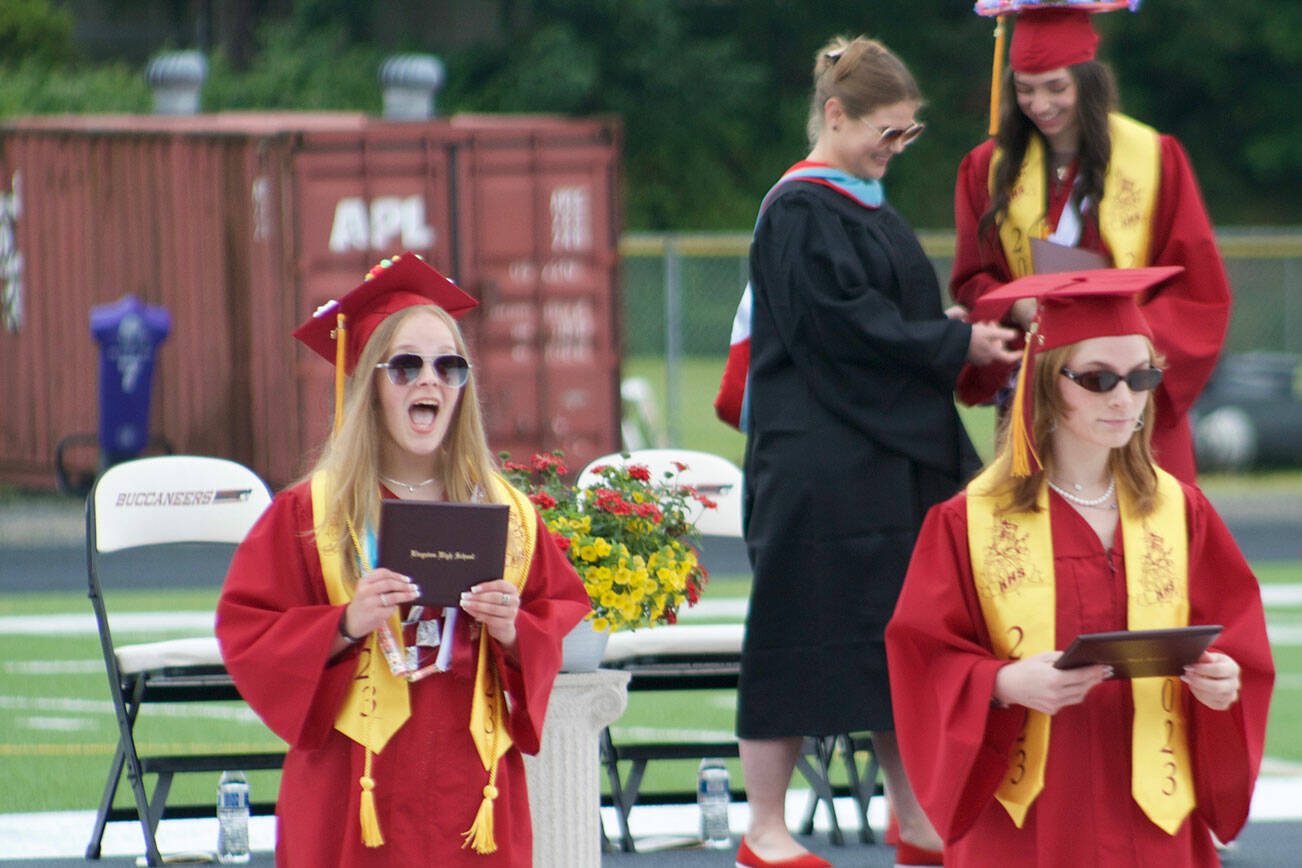 Tyler Shuey/Kitsap News Group
Happy graduates walk off the stage with diplomas in hand.