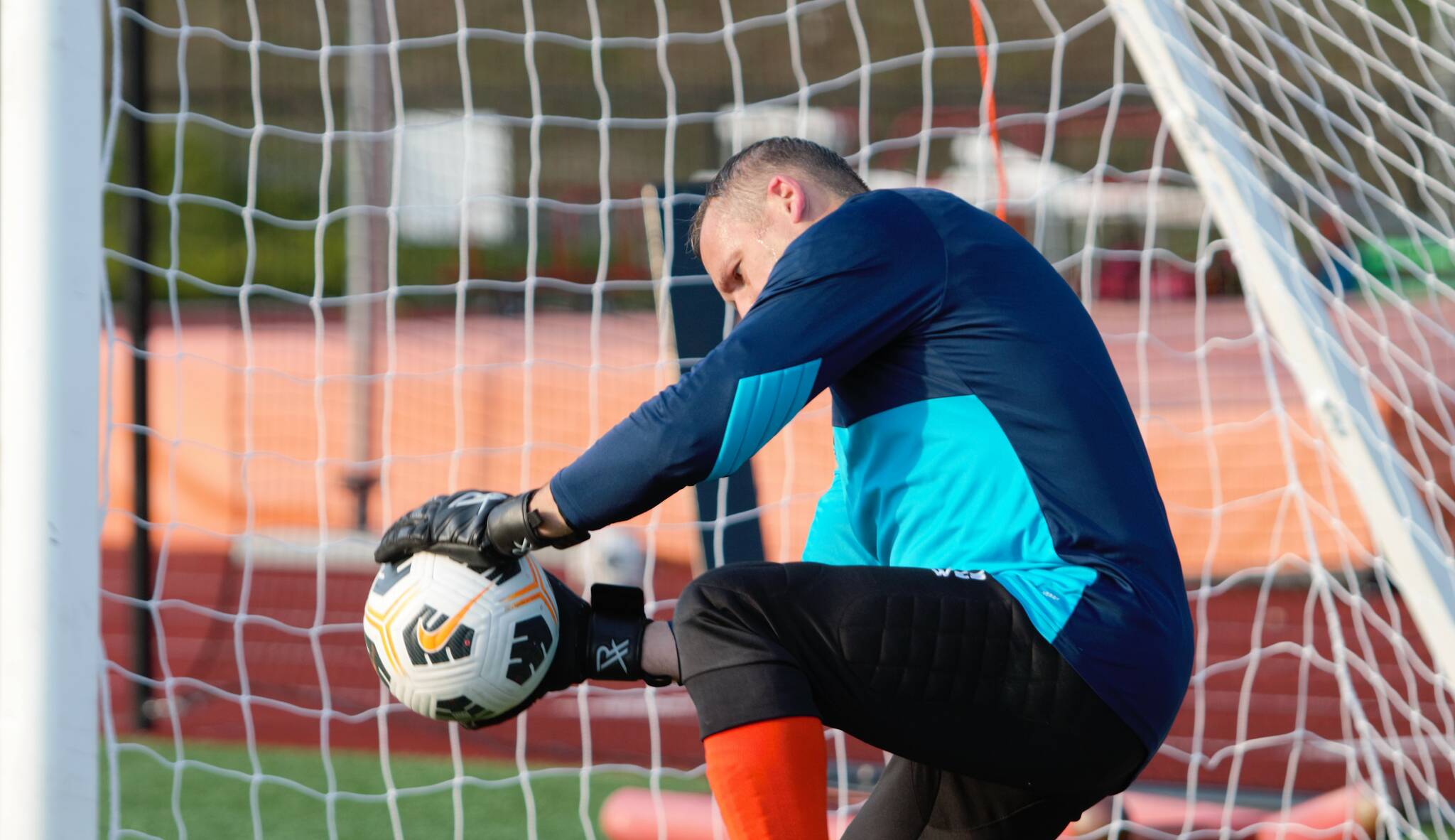 Caleb Tucker makes a save in warm ups at Central Kitsap High School. Elisha Meyer/Kitsap News Group Photos