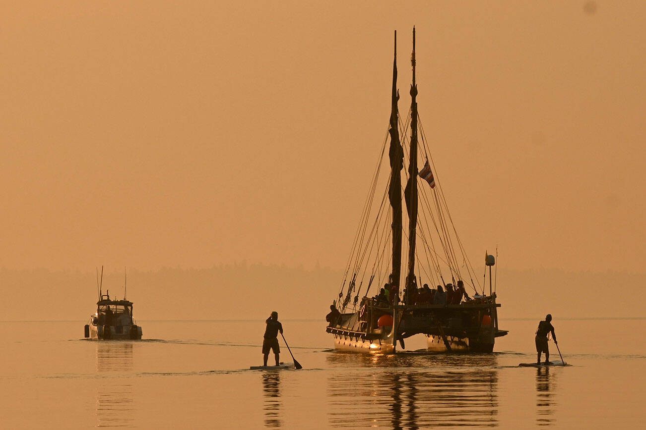 Byron Acohido courtesy photo
The Hōkūleʻa departs Suquamish dock the morning of Aug. 26 and heads for Seattle’s Pier 92, with an escort of local stand-up paddlers.