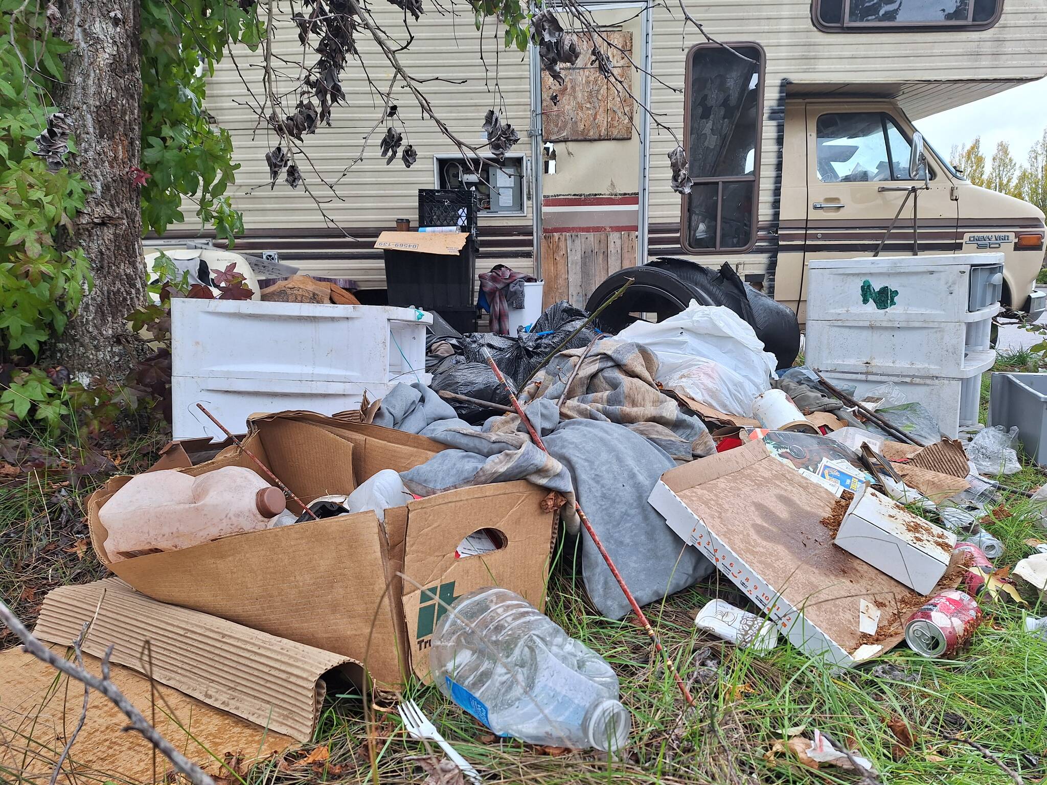 Elisha Meyer/Kitsap News Group Photos
Litter piles up next to a broken trailer in the Bravo Terrace encampment.