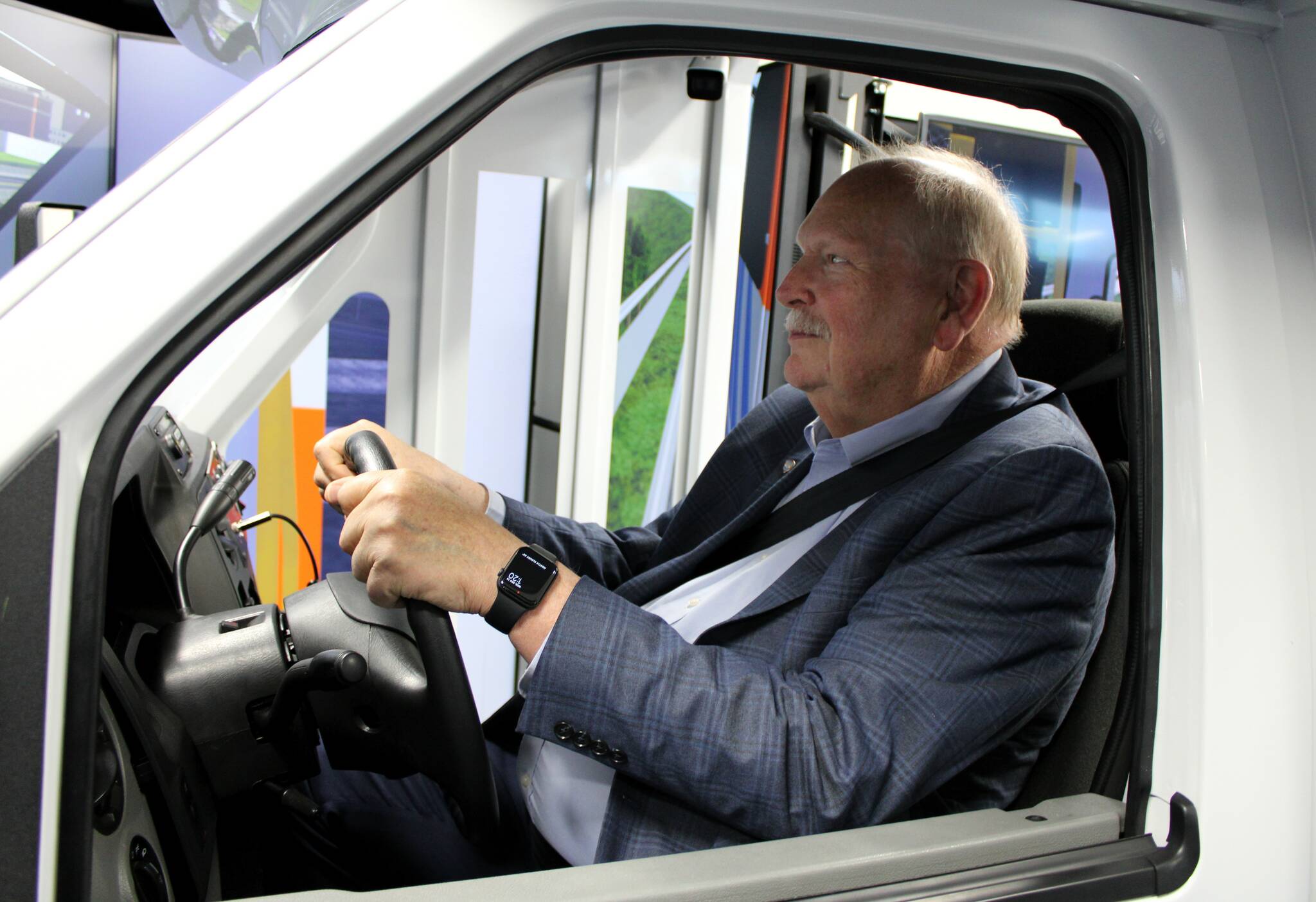 Elisha Meyer/Kitsap News Group Photos
Kitsap Transit’s John Clauson is buckled in and checks his mirrors while driving the agency’s new virtual bus simulator.