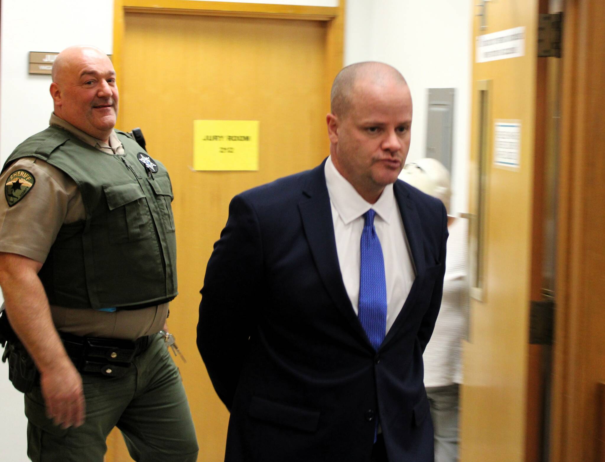 Elisha Meyer/Kitsap News Group Photos
Johnny Watson, one of three suspects in the case, is led back into the courtroom.