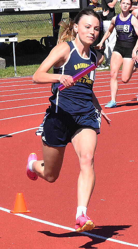 Nicholas Zeller-Singh/Kitsap News Group photos
Bainbridge’s Arden De Lanoy competes in the girls 4x200 relay.