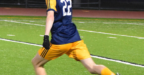 File photo
Finn McCallum pushes the ball upfield on a counterattack for Bainbridge.