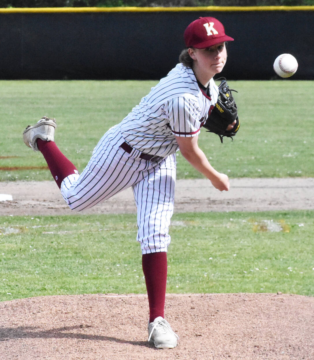 File Photos
Kingston’s Jack Butler pitches against Evergreen.