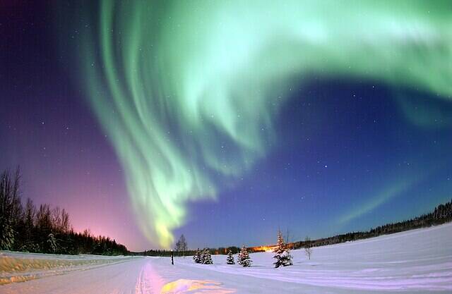 <p>Air Force courtesy photo</p>
                                <p>The Aurora Borealis shines above Bear Lake at Eielson Air Force Base, AK.</p>