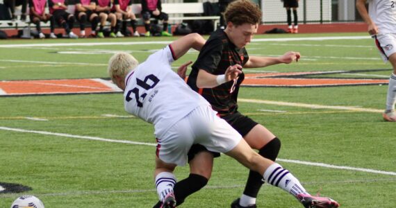 Elisha Meyer/Kitsap News Group
Sophomore James Duncan collides with a Ballard Beaver on a play, earning him a yellow card.