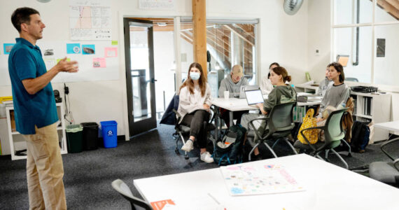 James Rufo-Hill, a science teacher at Hyla School on Bainbridge Island, teaches a climate change course that includes a project with Eco-Adapt and Washington State Ferries to illustrate the possible rising sea levels. Photo courtesy Hyla School