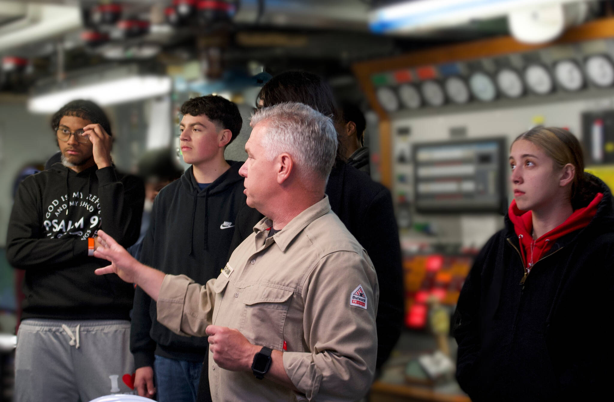 Molly Hetherwick/Kitsap News Group photos
Chief engineer Chris Blasko shows some visiting students around the control room of the Puyallup.