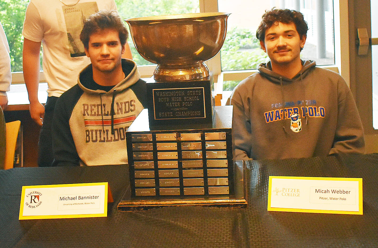 Nicholas Zeller-Singh/Kitsap News Group photos
Michael Bannister and Micah Guy sign to play water polo at Redlands and Pitzer College.