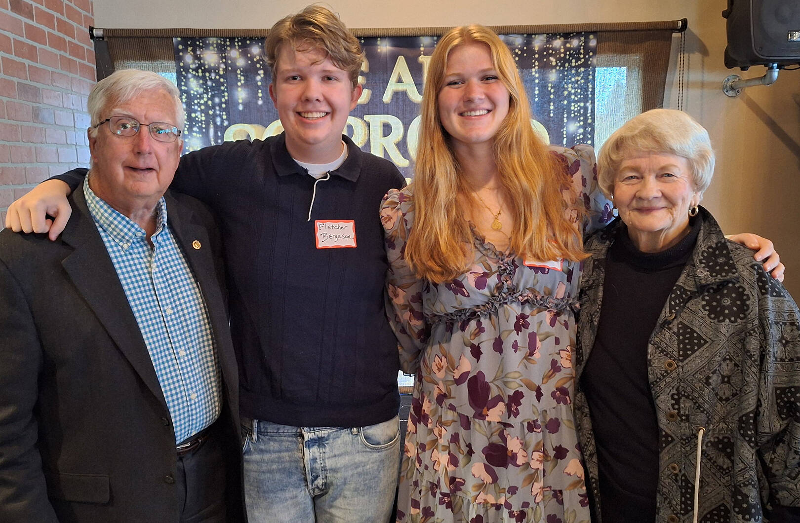 Elisha Meyer/Kitsap News Group
Fletcher Bergeson and Grace Degarimore are each awarded $5,000 Maynard Lundberg Memorial Scholarships. Standing at either side of them is Maynard Lundberg Education Foundation executive director Bill Evans and Janey Lundberg Pugh, Maynard’s daughter.