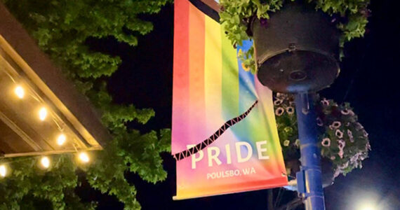 Pam Keeley courtesy photo
A Pride banner in downtown Poulsbo that was cut by a knife has since been stitched back together by a community member.