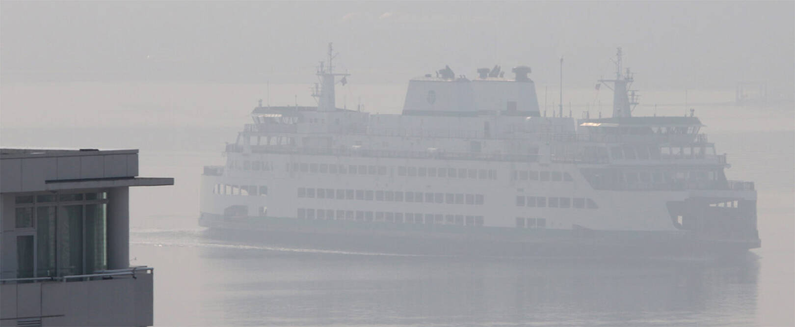 KPHD courtesy photos
It’s not a foggy day. That’s smoke from a wildfire hiding one of the Washington State Ferries.