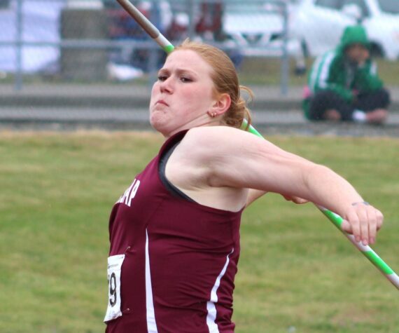 Elisha Meyer/Kitsap News Group
Grace Degarimore muscles up for her state-winning javelin throw in the finals.