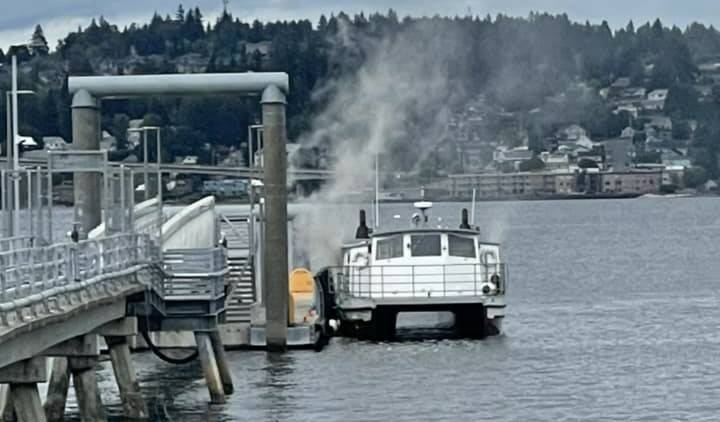 Michael Yakowenko courtesy photo
Eyewitnesses catch an image of the Admiral Pete still smoking as it arrives at the Annapolis ferry dock.