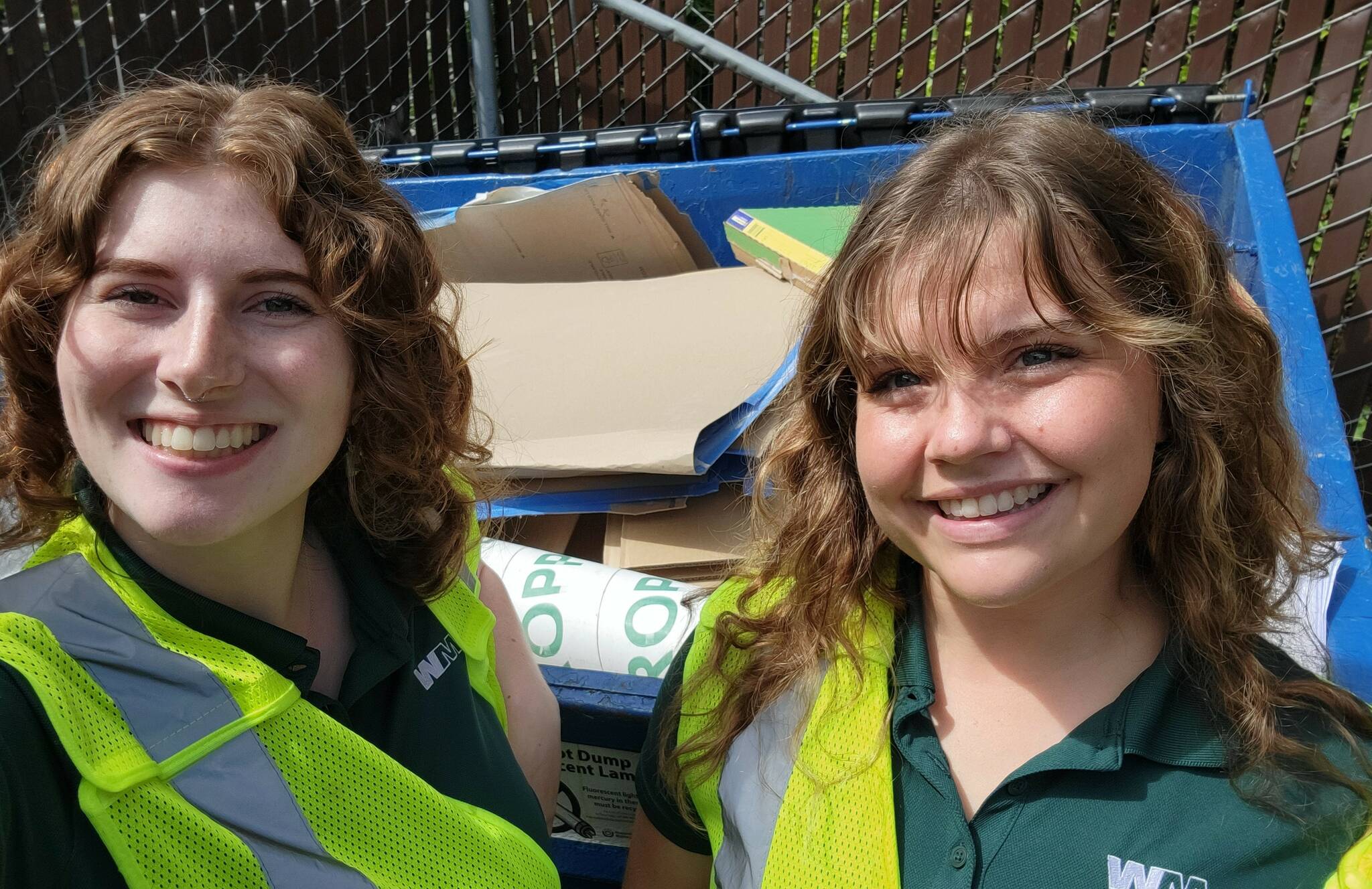 Waste Management courtesy photo
Interns Lena Yates, left, and Emma Anderson with the Waste Management Recycle Corps.