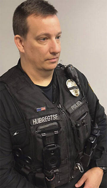 File photo
Port Orchard officer David Huibregtse wears a body camera.