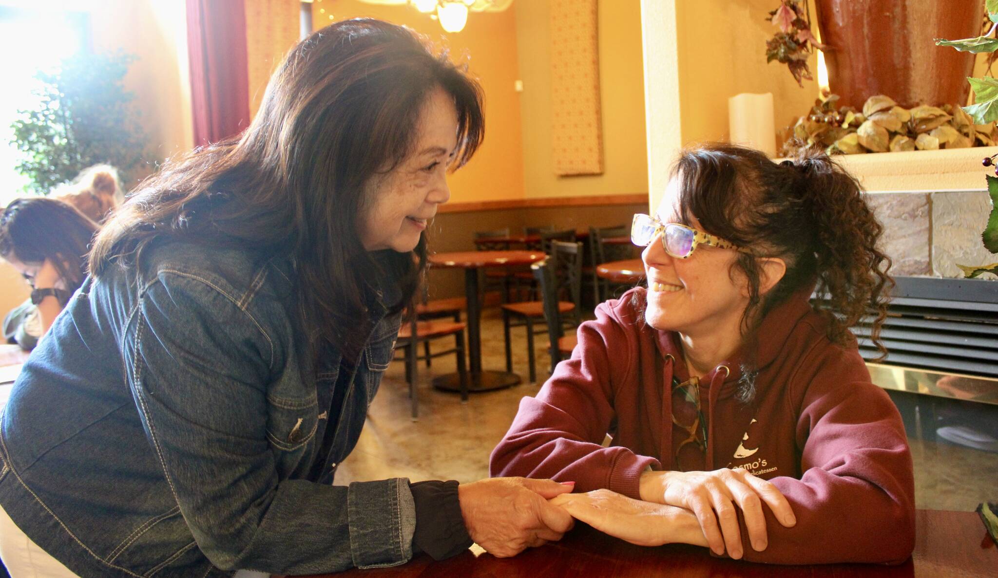 Elisha Meyer/Kitsap News Group photos
Co-owner Christina Balazs, right, has been getting regular hugs and handshakes from patrons since the announcement that Cosmo’s is closing its doors.