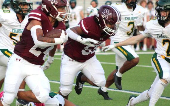 Elisha Meyer/Kitsap News Group photos
Senior running back Brycen Clay takes off on his first of many explosive runs on a four-touchdown day.