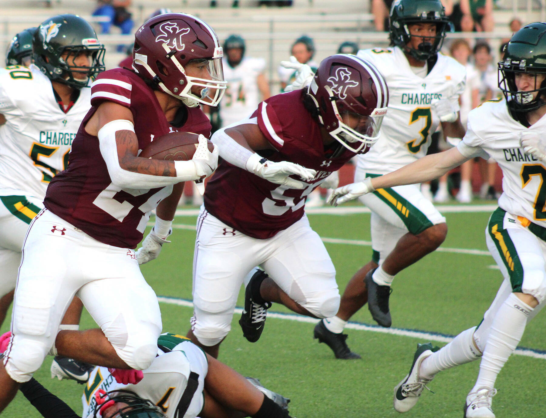 Elisha Meyer/Kitsap News Group photos
Senior running back Brycen Clay takes off on his first of many explosive runs on a four-touchdown day.