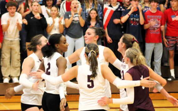 Elisha Meyer/Kitsap News Group
The South Kitsap players and student section celebrate a point in the third set against the North Kitsap Vikings.