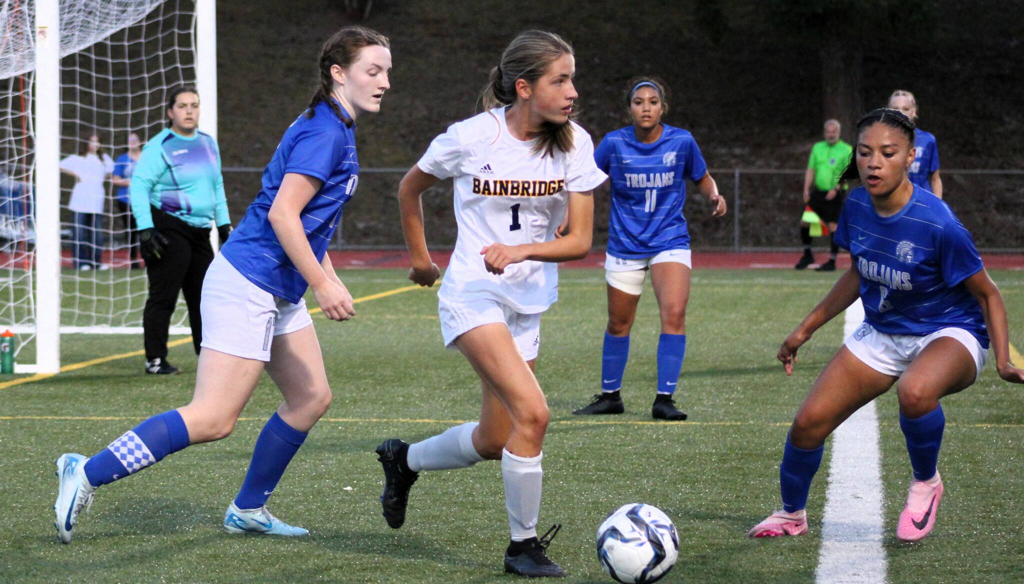 Elisha Meyer/Kitsap News Group photos
Bainbridge freshman Vega Hendrickson tries to find a teammate near the goal of the Olympic Trojans.