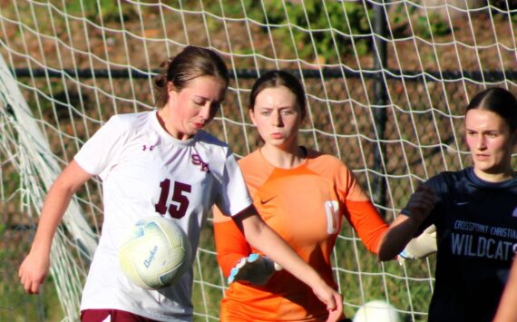 Elisha Meyer/Kitsap News Group photos
SK senior Sierra Defevers works quickly to try and force the ball into the Crosspoint goal.