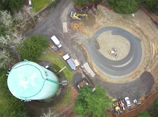 COBI courtesy photos
This shot from above shows the old water tank at left and where the new one is being constructed.