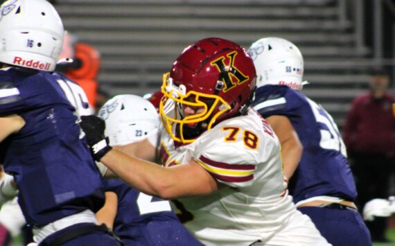 Elisha Meyer/Kitsap News Group photos
Kingston Junior offensive lineman Jack Grady tries to keep a pass rusher contained.