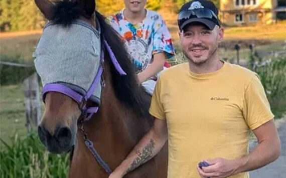 GoFundMe courtesy photo
Dan Stamm, right, at the Back to the Bond Sanctuary Farm.