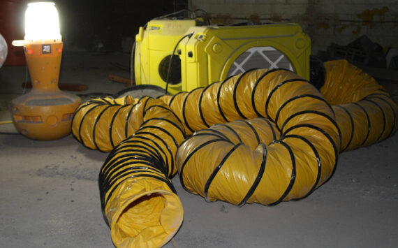 Molly Hetherwick/Kitsap News Group
A ventilator tube is prepared to funnel dust out of the enclosed space when renovation begins.