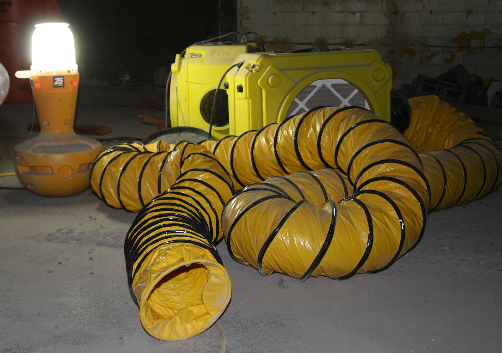 Molly Hetherwick/Kitsap News Group
A ventilator tube is prepared to funnel dust out of the enclosed space when renovation begins.