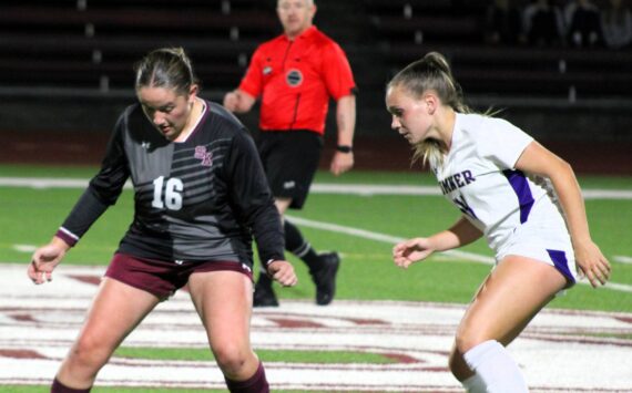 Elisha Meyer/Kitsap News Group photos
SK junior Ella Sherwood competes with a Sumner player for possession of the ball.