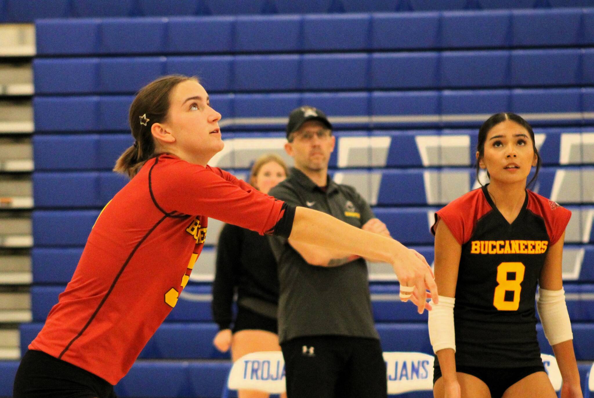 Elisha Meyer/Kitsap News Group photos
Buc senior Corynn Heuer, left, gets the serve up in a match at Olympic High School.