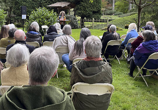 Bloedel courtesy photo 
Bainbridge Island poet laureate Michele Bombardier welcomes guests to a poetry reading at the Bloedel Reserve honoring renowned poet Theodore Roethke, who died there in 1963.