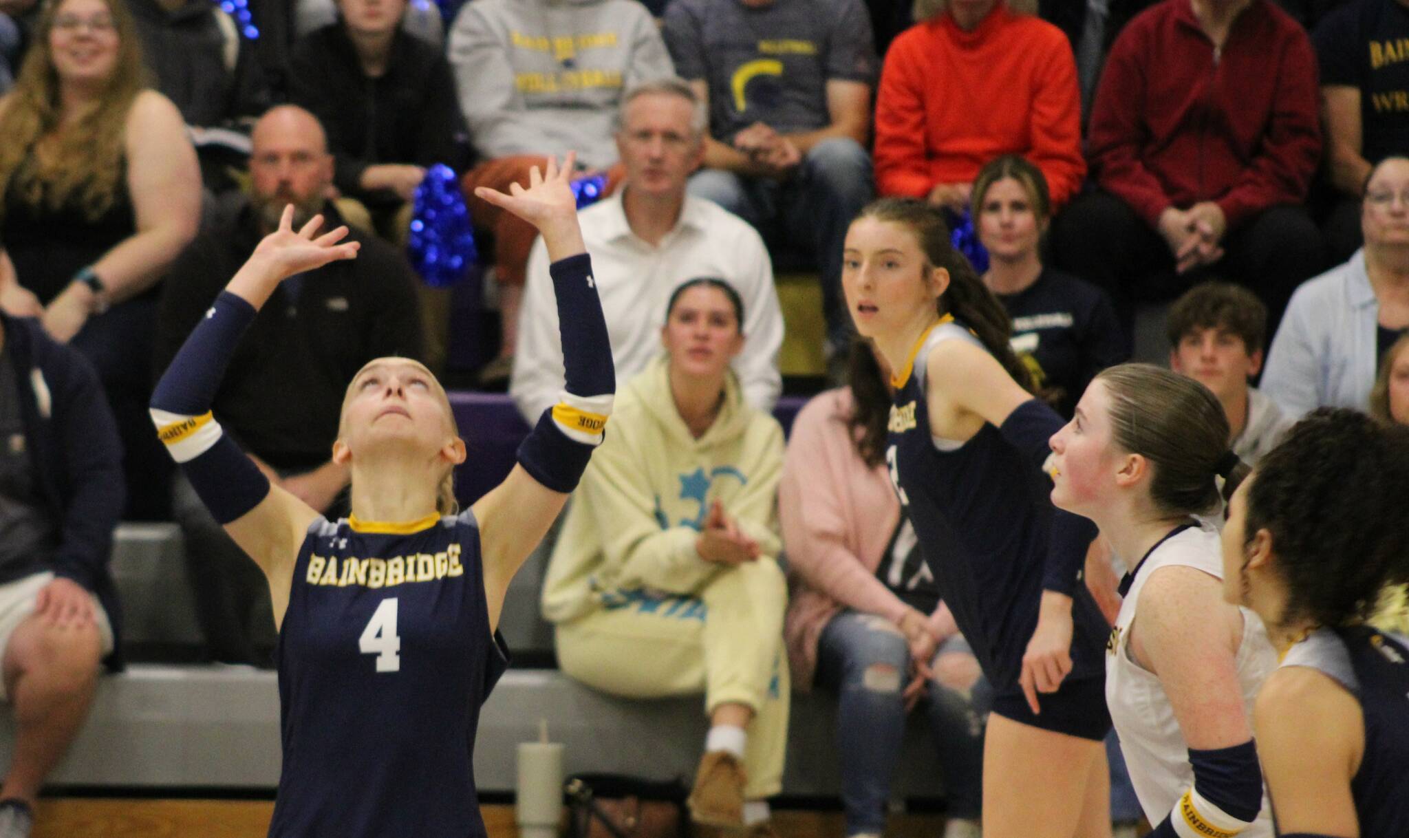 Elisha Meyer/Kitsap News Group photos
A line of Spartan attackers prepare to approach the net as senior setter Lola Batcheller gets underneath the ball.