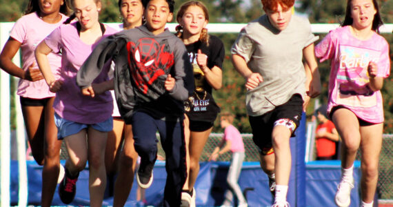 Elisha Meyer/Kitsap News Group photos
Track athletes sprint down the new football/soccer field at Mountain View Middle School in Bremerton.