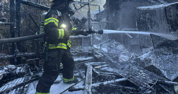 PFD courtesy photo
A mobile home near Poulsbo is a total loss following a fire Oct. 10 that was caused by aged wiring in a living room wall.