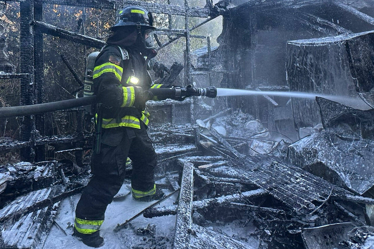 PFD courtesy photo
A mobile home near Poulsbo is a total loss following a fire Oct. 10 that was caused by aged wiring in a living room wall.