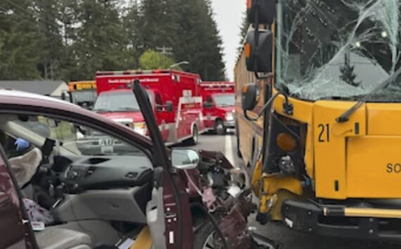 KCSO courtesy photo
A South Kitsap school bus was damaged after a driver ran a red light, colliding with a turning vehicle and the bus on Jackson Avenue SE.