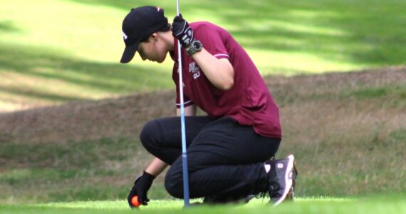 Elisha Meyer/Kitsap News Group photos
Sophomore Elsie Sladek tees the ball up on the 16th hole at Gold Mountain Golf Club in Bremerton.