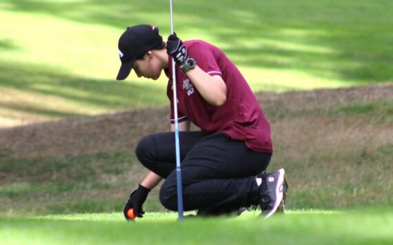 Elisha Meyer/Kitsap News Group photos
Sophomore Elsie Sladek tees the ball up on the 16th hole at Gold Mountain Golf Club in Bremerton.