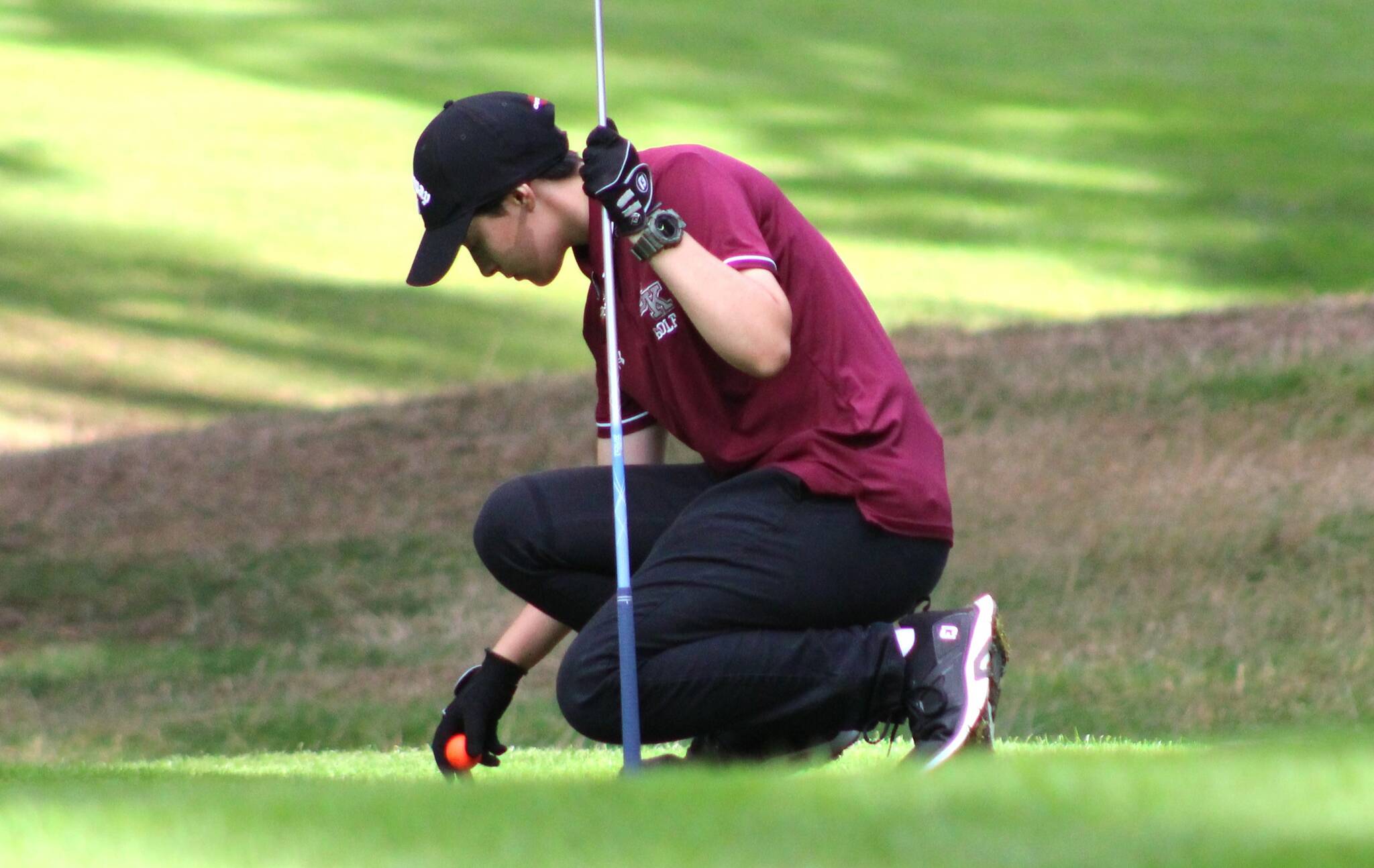 Elisha Meyer/Kitsap News Group photos
Sophomore Elsie Sladek tees the ball up on the 16th hole at Gold Mountain Golf Club in Bremerton.