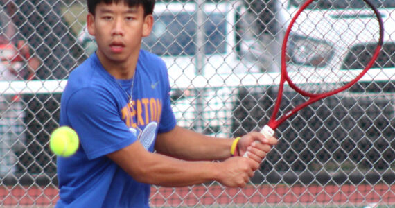 Elisha Meyer/Kitsap News Group photos
Bremerton’s Joseph Cao prepares to hit a backhand in his league semifinal match.