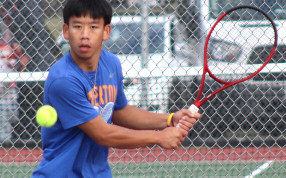 Bremerton’s Joseph Cao prepares to hit a backhand in his league semifinal match.