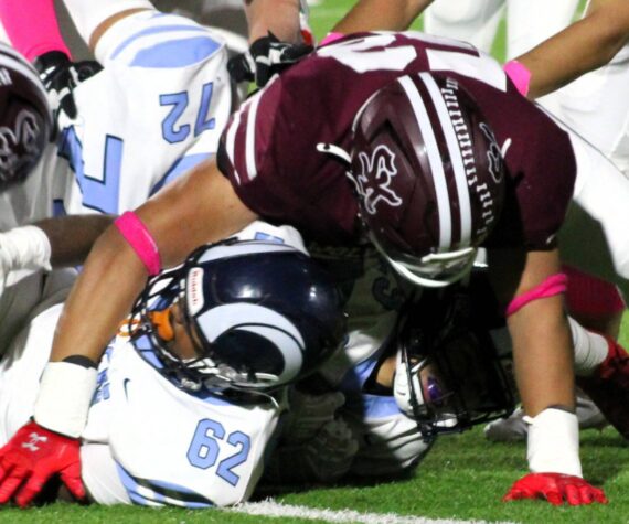 Elisha Meyer/Kitsap News Group photos
SK senior Josaiah Asuega takes down a Rogers ball carrier in the first half of an Oct. 25 game.