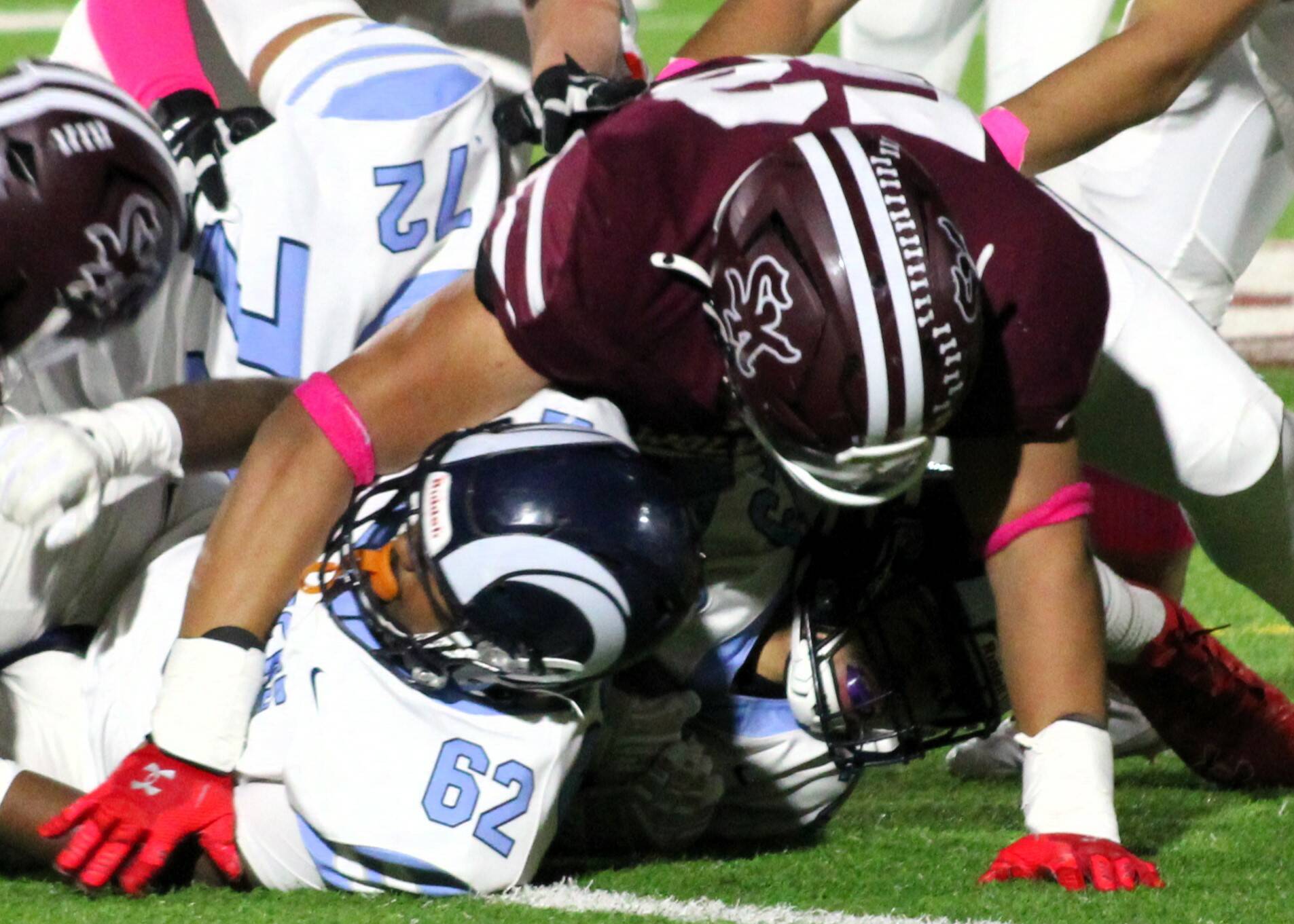 Elisha Meyer/Kitsap News Group photos
SK senior Josaiah Asuega takes down a Rogers ball carrier in the first half of an Oct. 25 game.